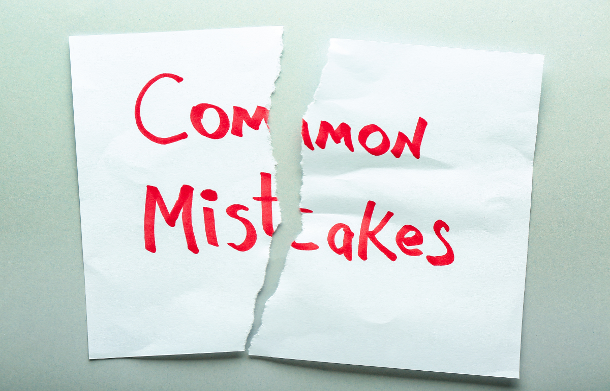 Image depicting a torn piece of paper with a list of common trading mistakes written on it, 5 Biggest Mistakes New Traders Make including planning, risk management, emotions, overtrading, and expectations.