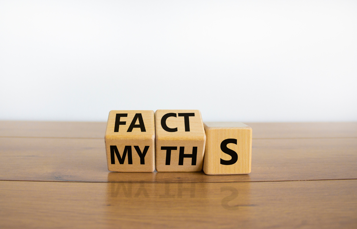 3 die depicting the words 'facts' and 'myths'
